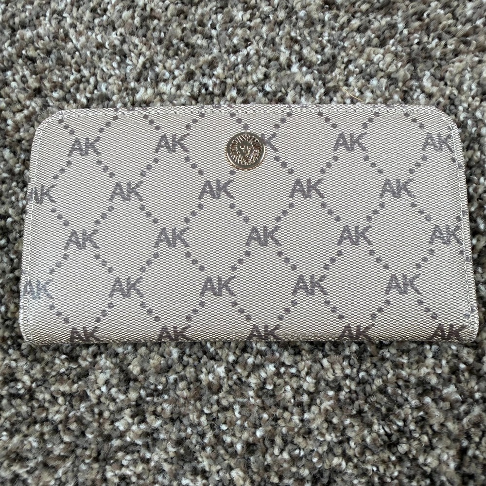 Anne Klein AK Monogram Logo Slim Bifold Wallet Tan Cream Gold Tone Lion Emblem